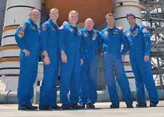 Endeavour's crew in front of Endeavour