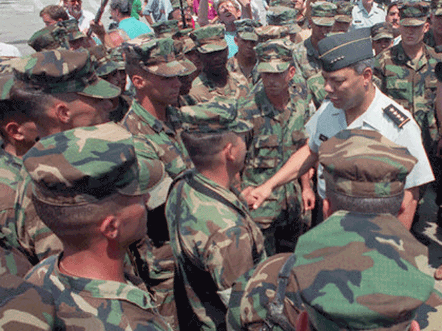 Gen. Colin Powell with Marines UPI/Dan Sears